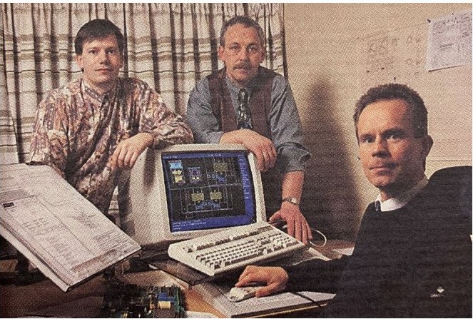 Design & development engineers reviewing an opened cabinet