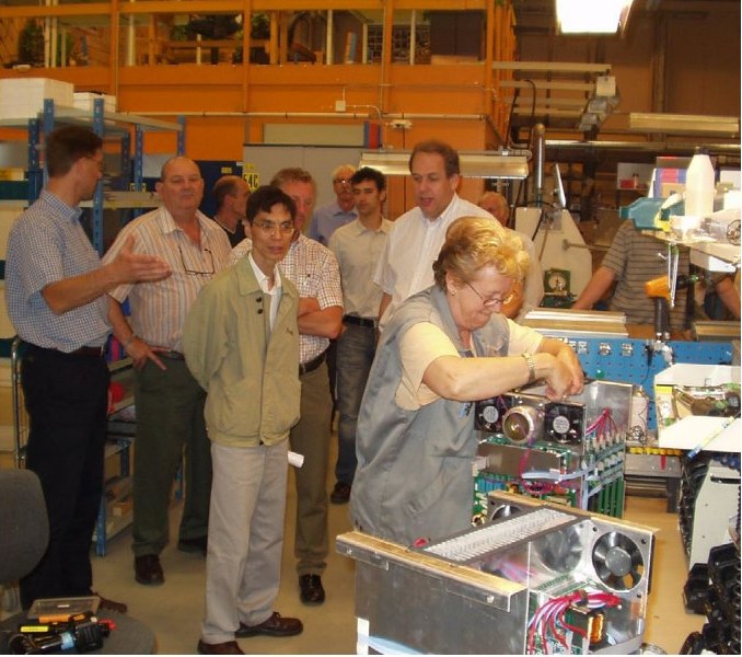FlexKraft engineering team around the prototype, late 2000s