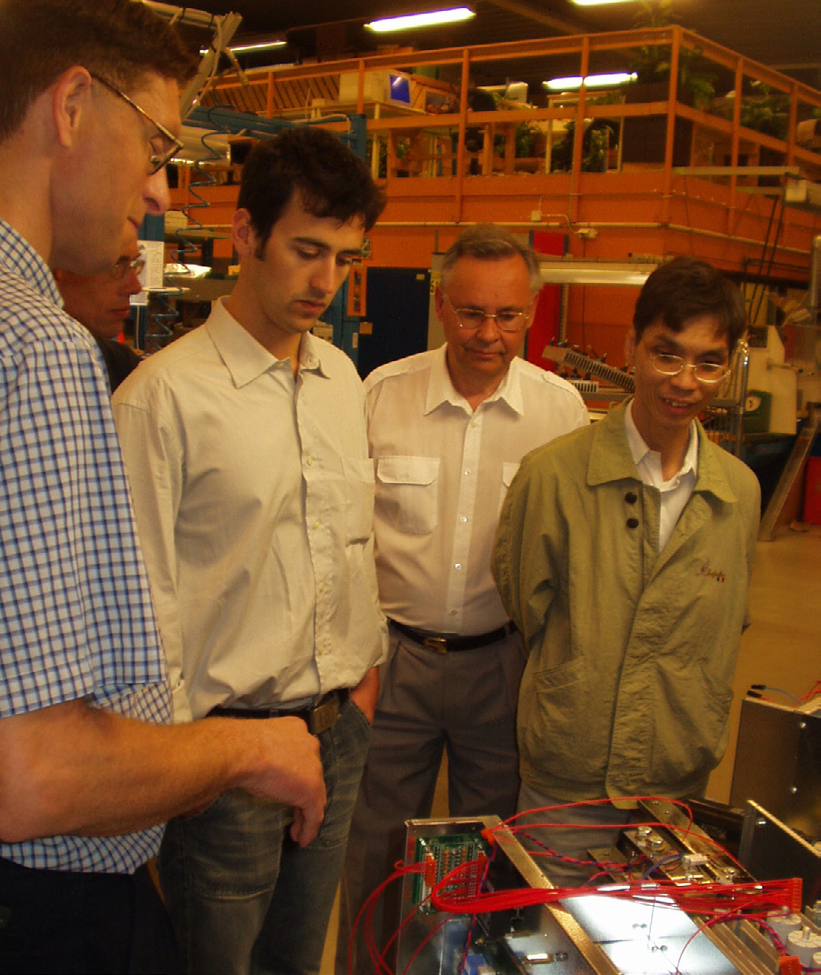 FlexKraft engineering team around the prototype, late 2000s