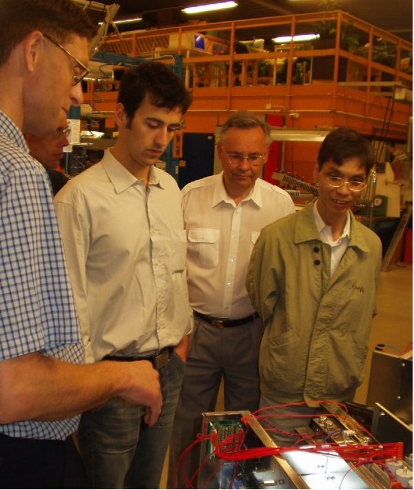 FlexKraft engineering team around the prototype, late 2000s