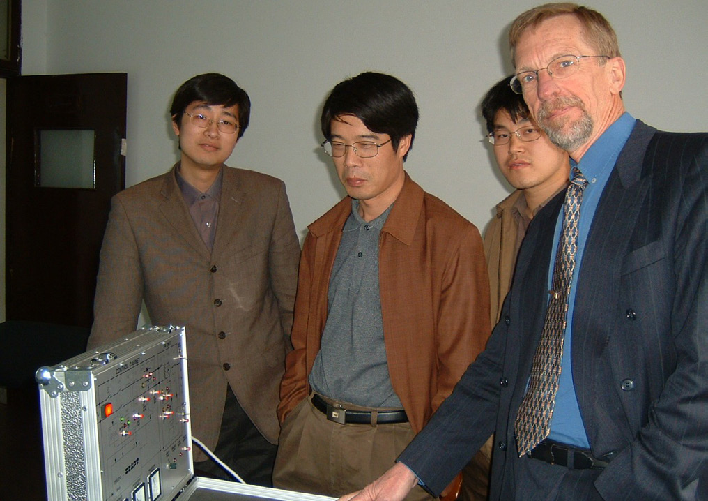 FlexKraft engineering team around the prototype, late 2000s