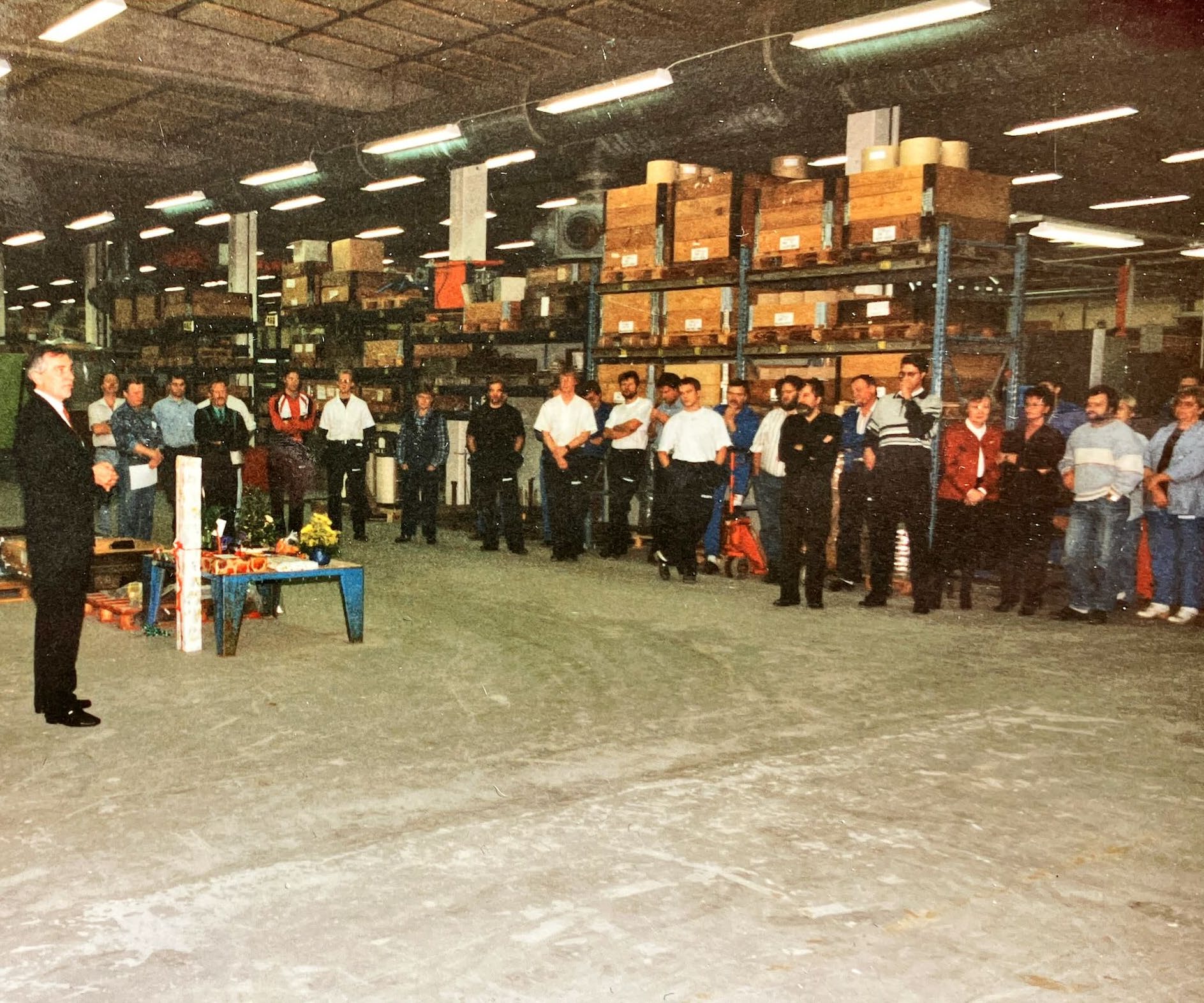 Björn Svensson during a meeting in a Surte warehouse, 1980s